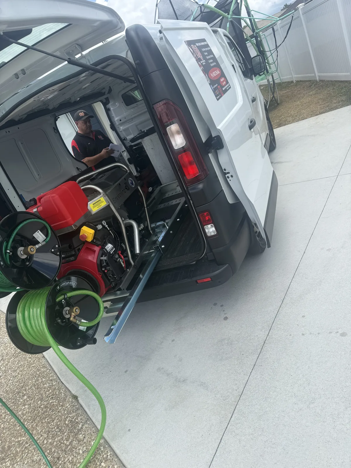 Drain inspection camera and drain clearing reels in the back of the Logan Plumbing & Gas van